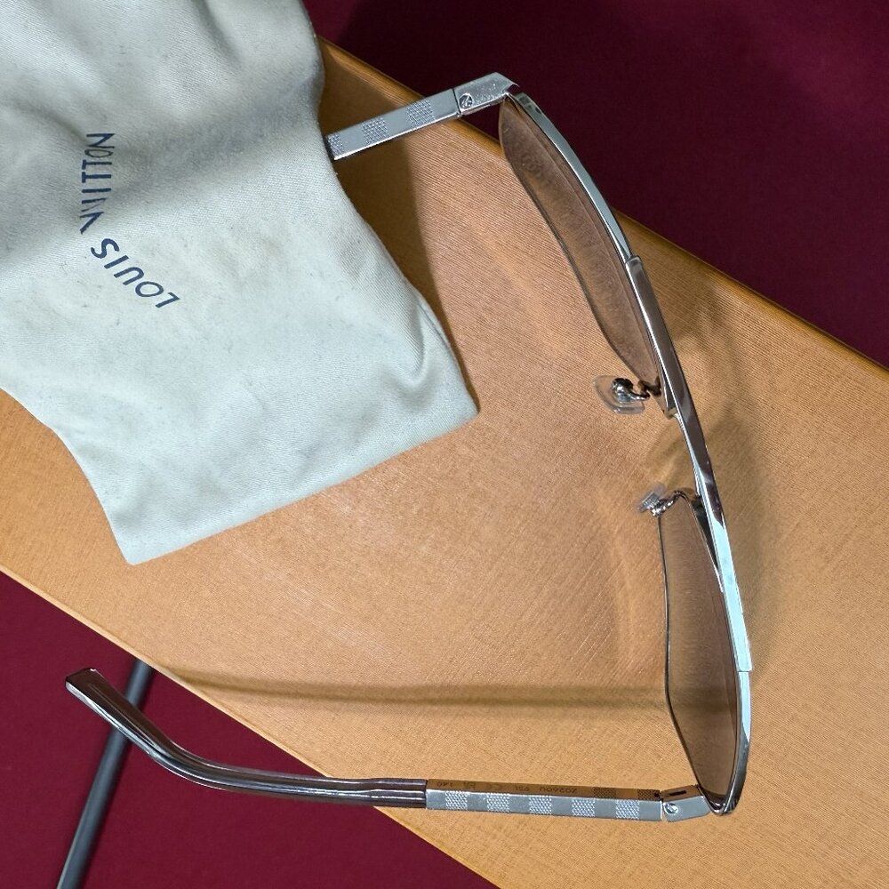 Louis Vuitton Men's Sunglasses - Silver framed.